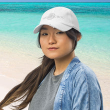 Load image into Gallery viewer, A perfectly understated summer baseball hat with white on white embroidery. Flows seamlessly with the Greek summer lifestyle. Chill on the beach, sail the Aegean, sip your iced coffee.  Each hat is individually embroidered in Europe when you order.
