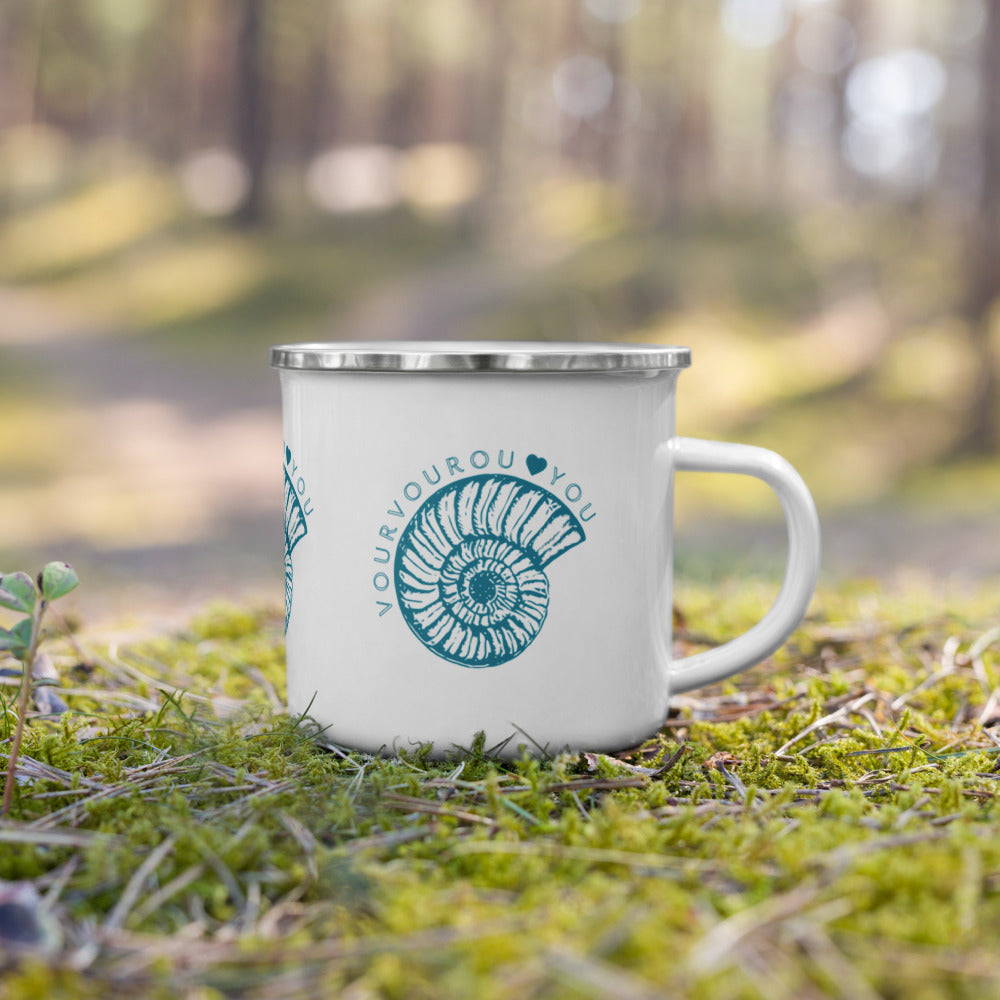 Vourvourou enamel mug. It does not break. It is not plastic. It clearly states that Vourvourou loves You. What else can we say? Here is your ideal outdoor, pool and child-fiendly mug.